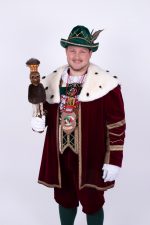 Red 'Sorry We Are Closed' sign displayed in a shop window indicating closure.