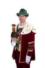 Red 'Sorry We Are Closed' sign displayed in a shop window indicating closure.