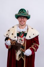 Red 'Sorry We Are Closed' sign displayed in a shop window indicating closure.