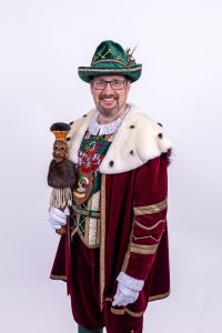 Red 'Sorry We Are Closed' sign displayed in a shop window indicating closure.